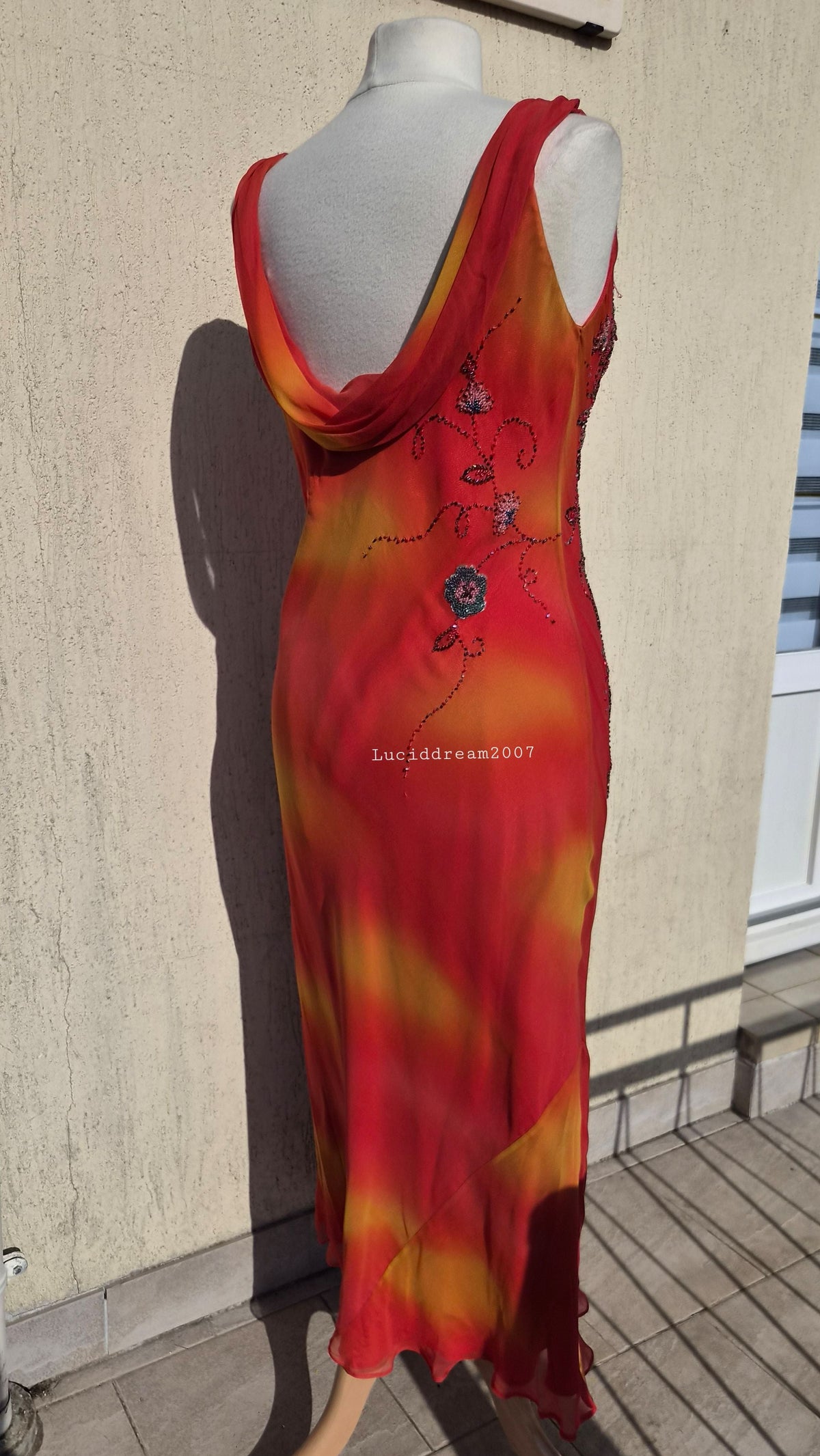 Embroidered orange silk dress