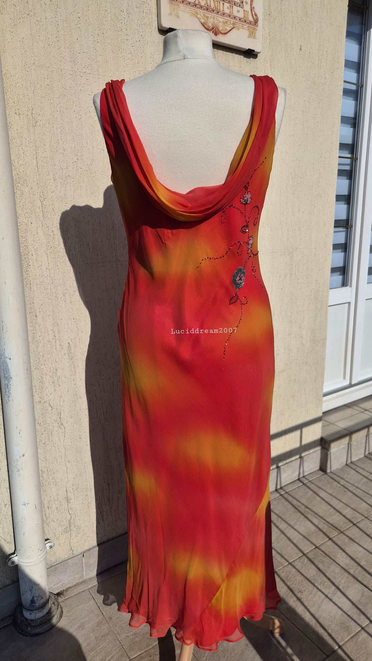 Embroidered orange silk dress