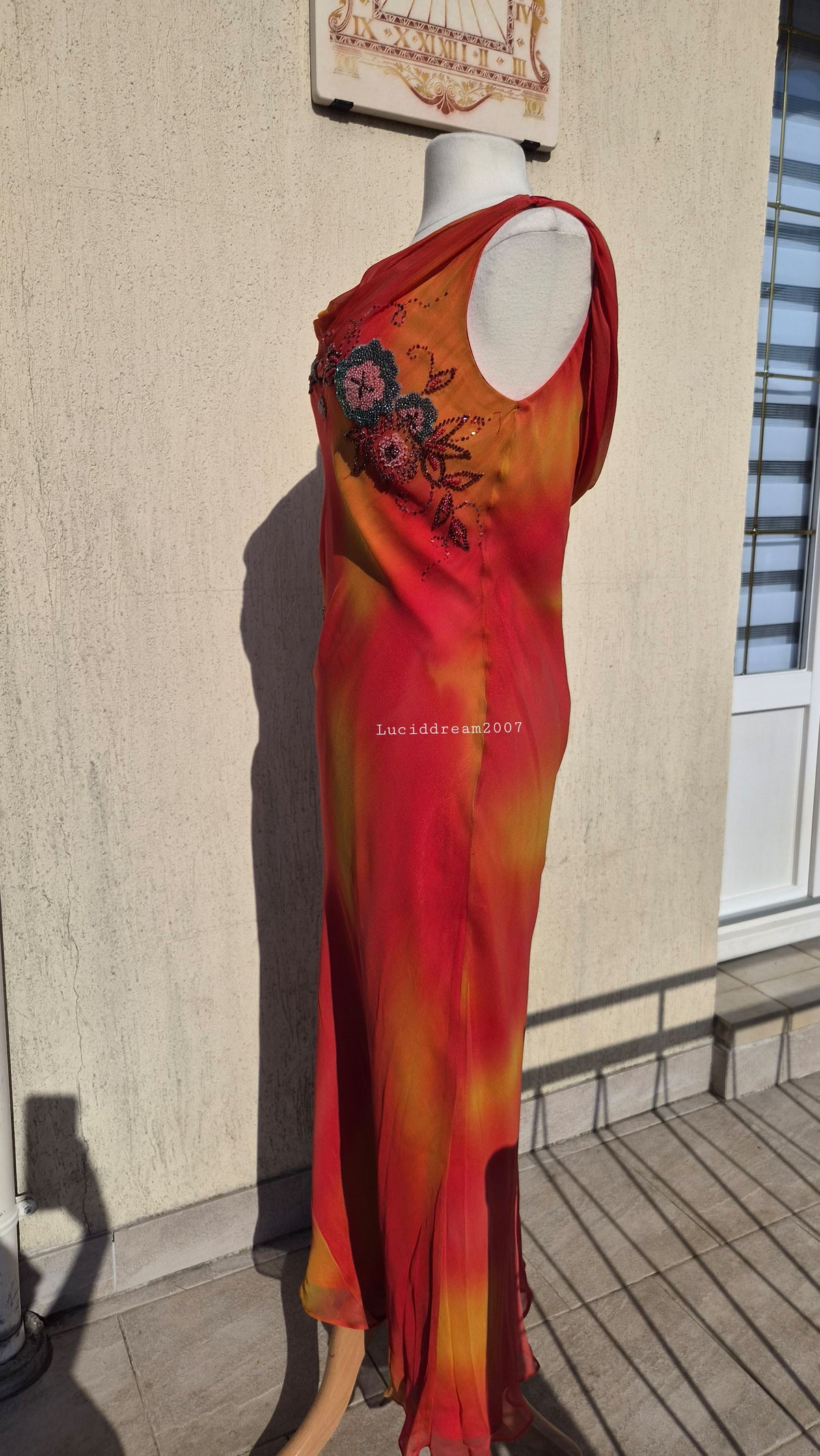 Embroidered orange silk dress