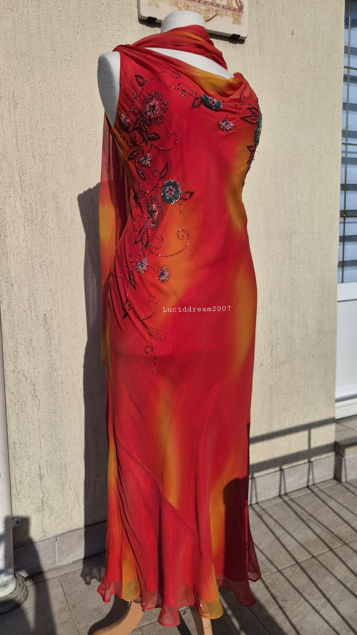 Embroidered orange silk dress