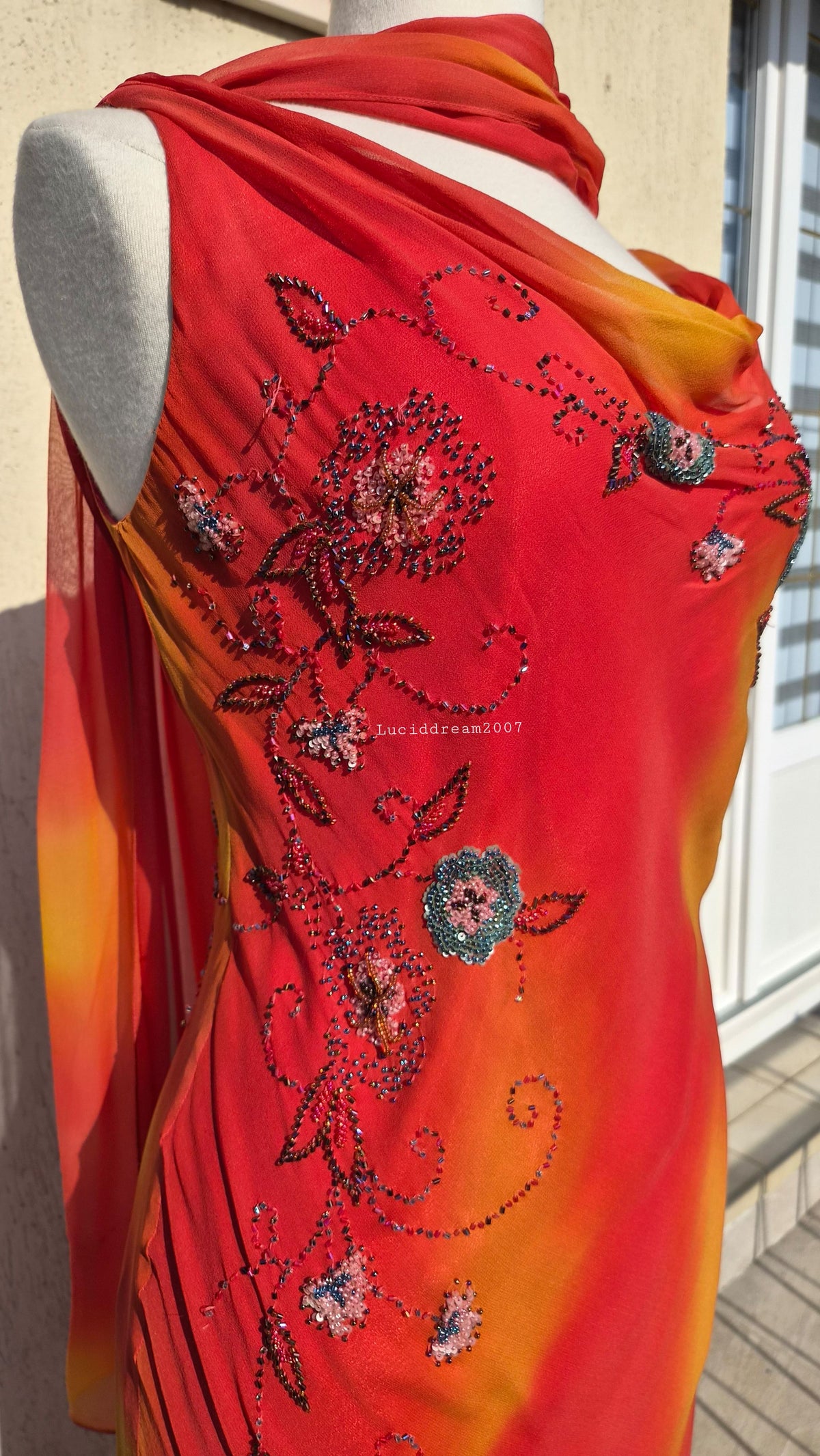 Embroidered orange silk dress