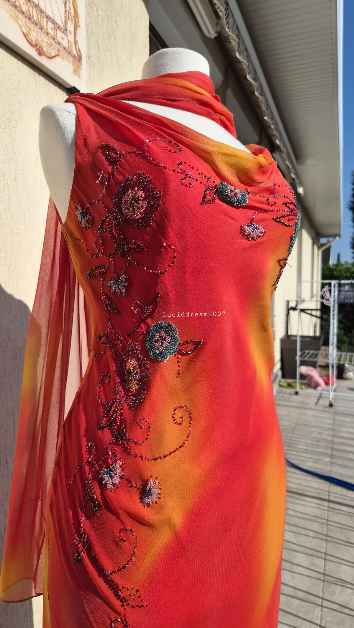 Embroidered orange silk dress