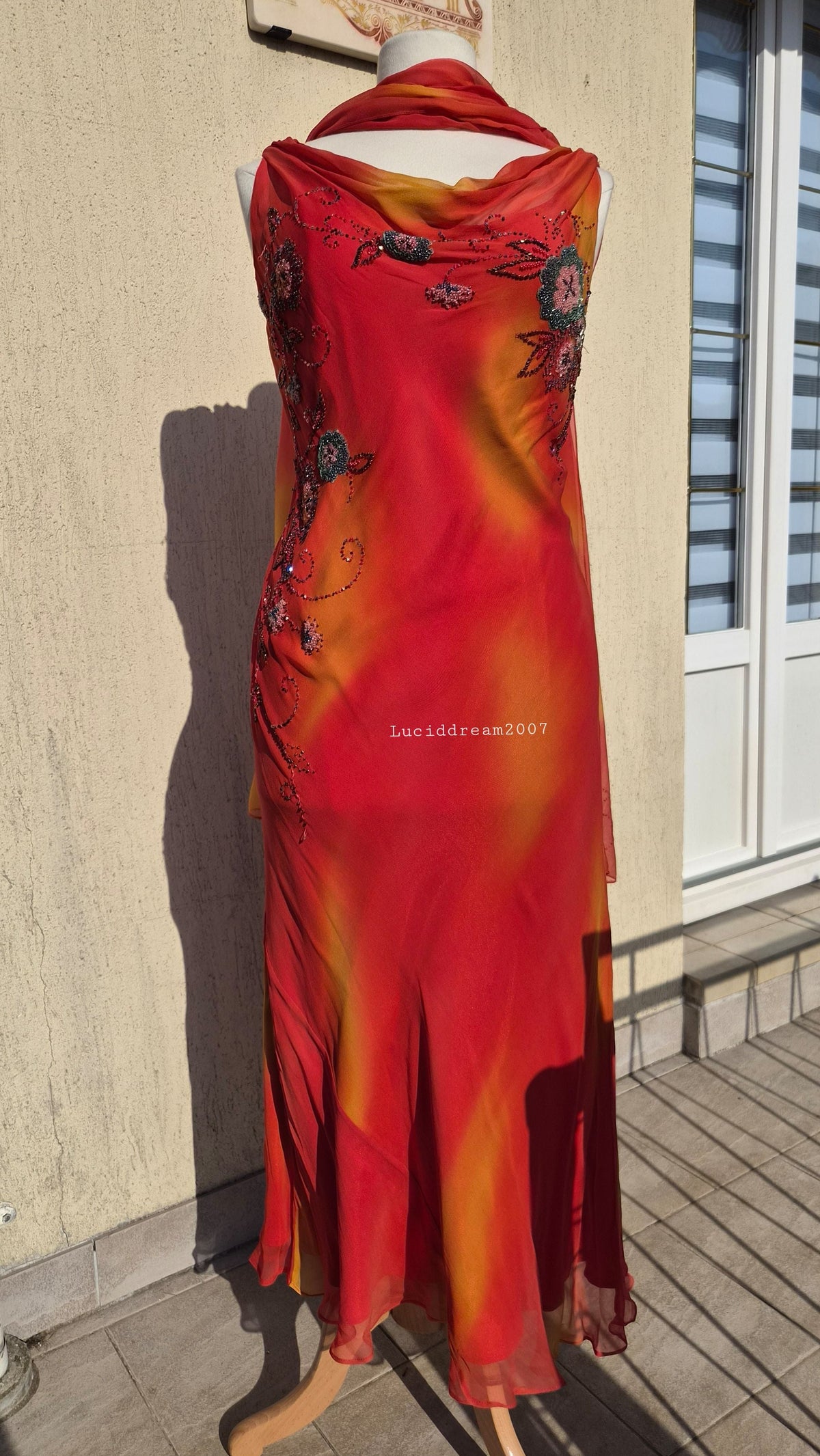 Embroidered orange silk dress