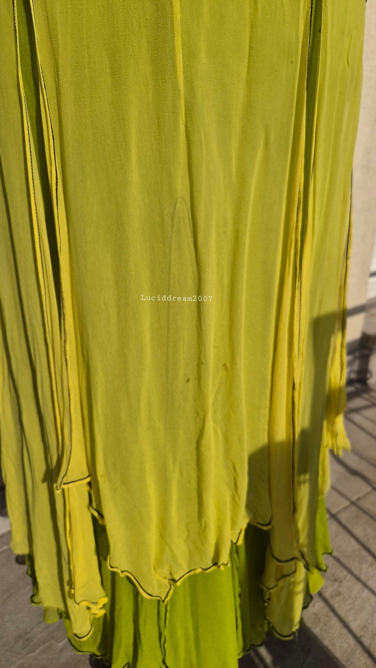 Embroidered silk dress in green tones