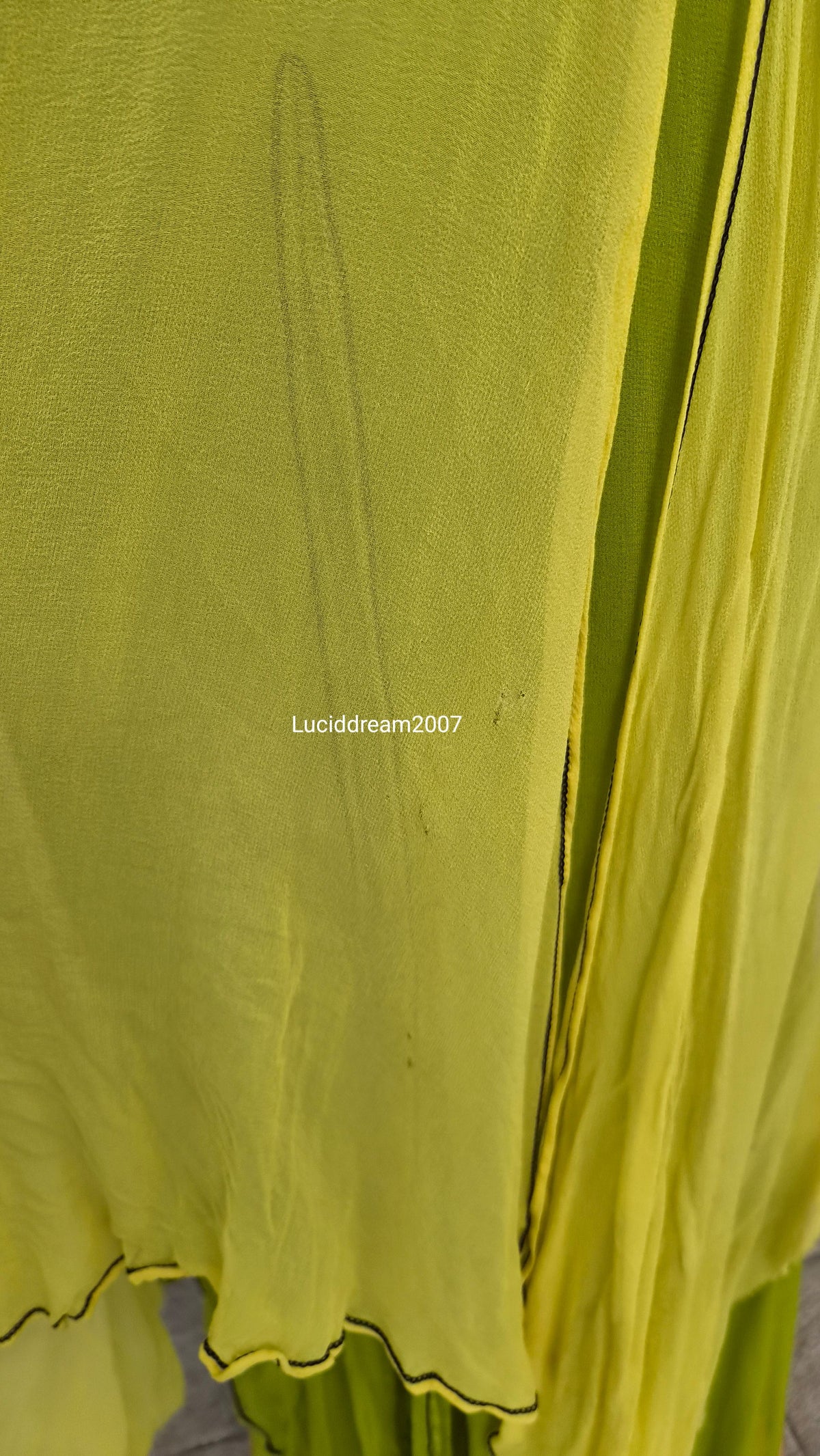 Embroidered silk dress in green tones