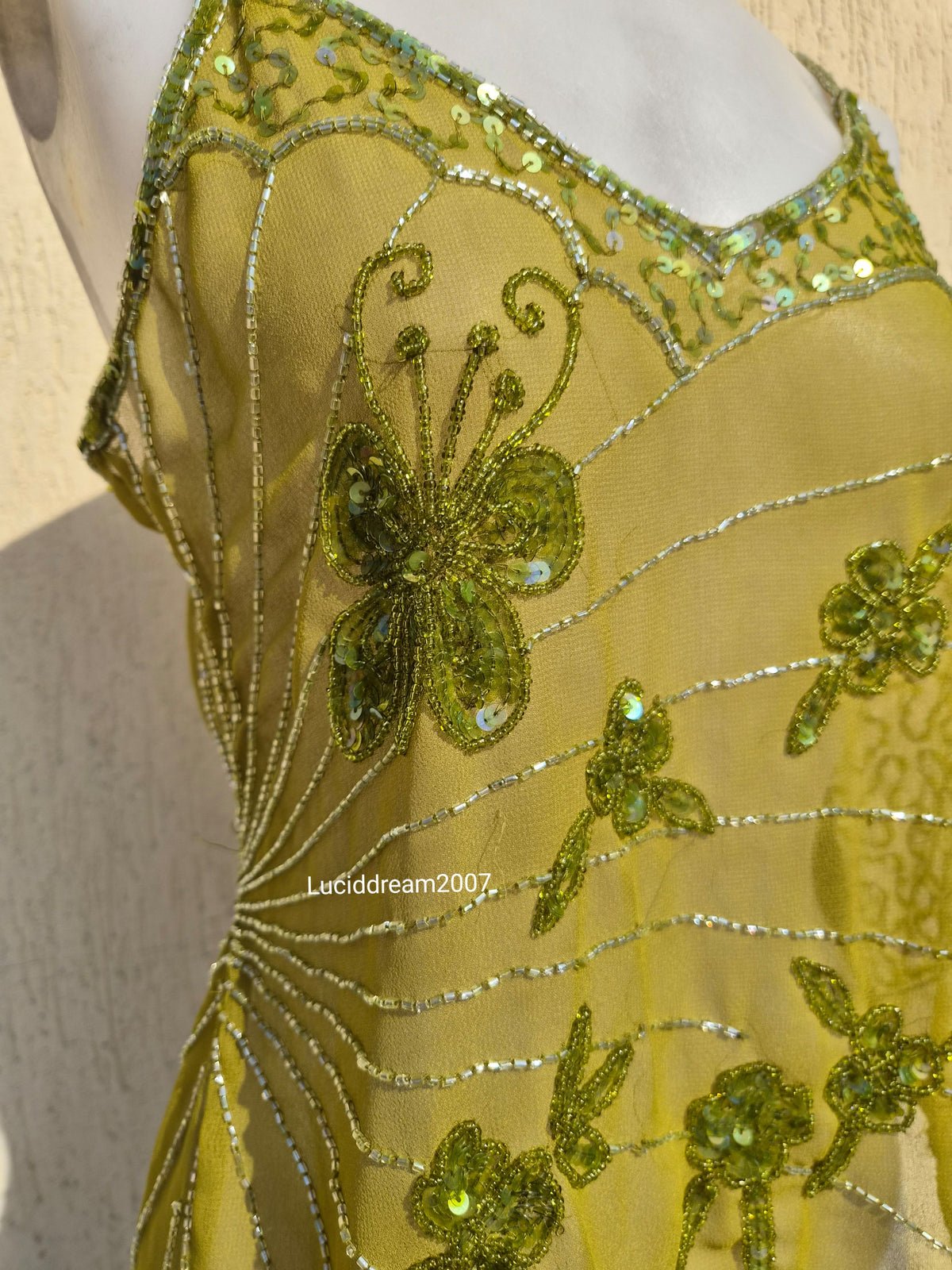 Haut en voile et sequins verts