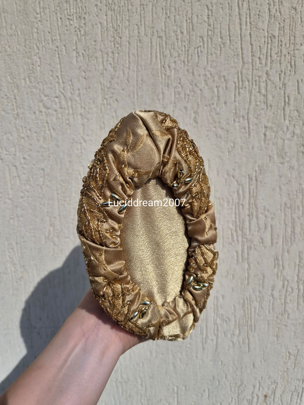 Embroidered gold bag