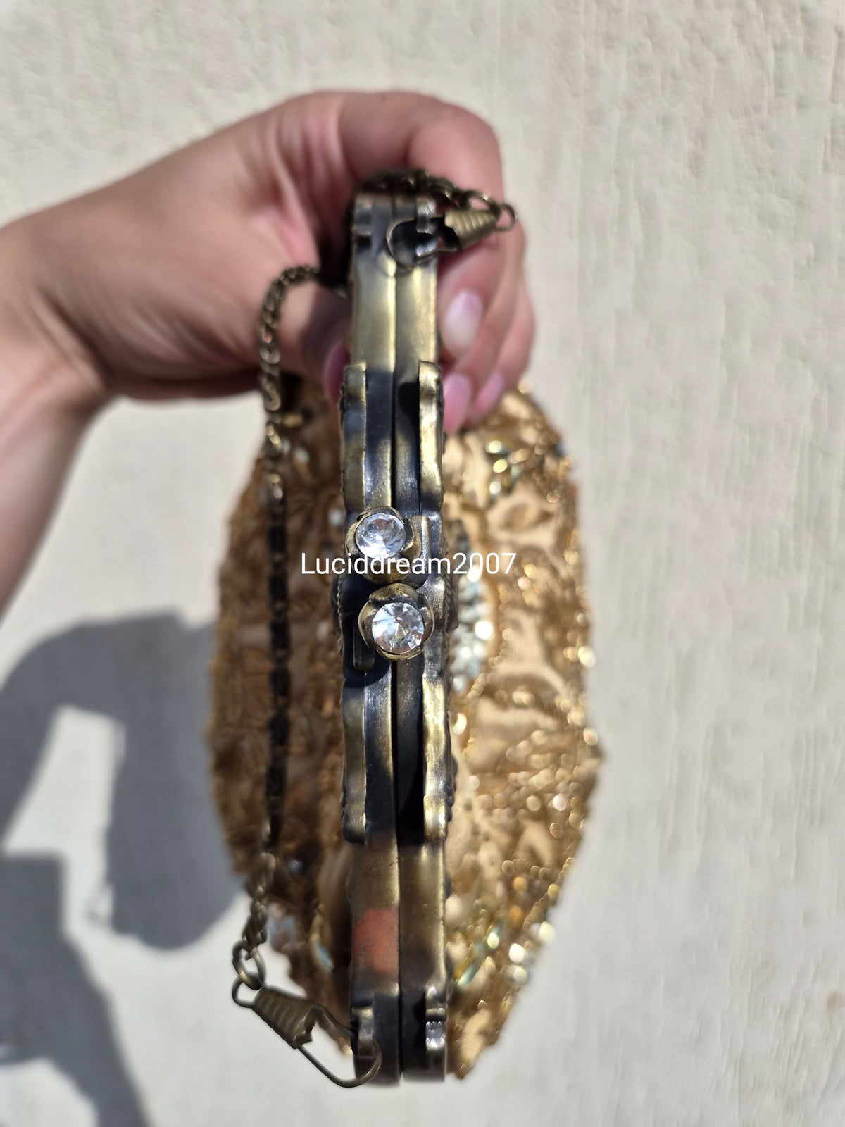 Embroidered gold bag
