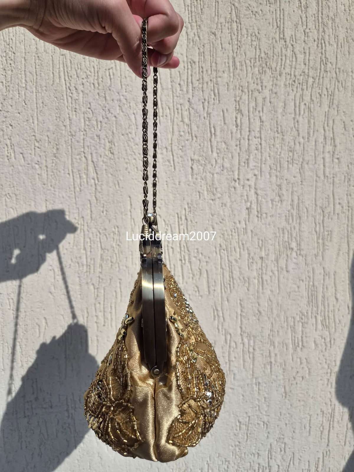 Embroidered gold bag