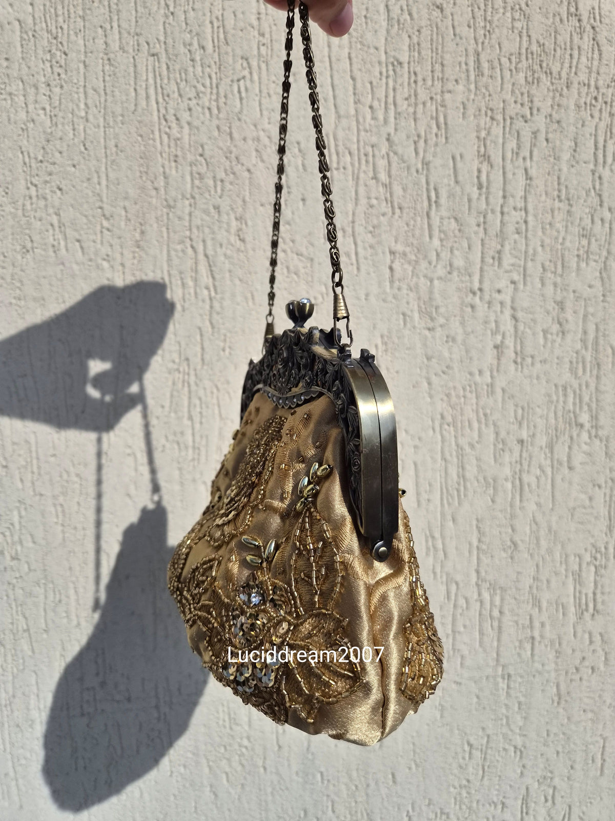 Embroidered gold bag