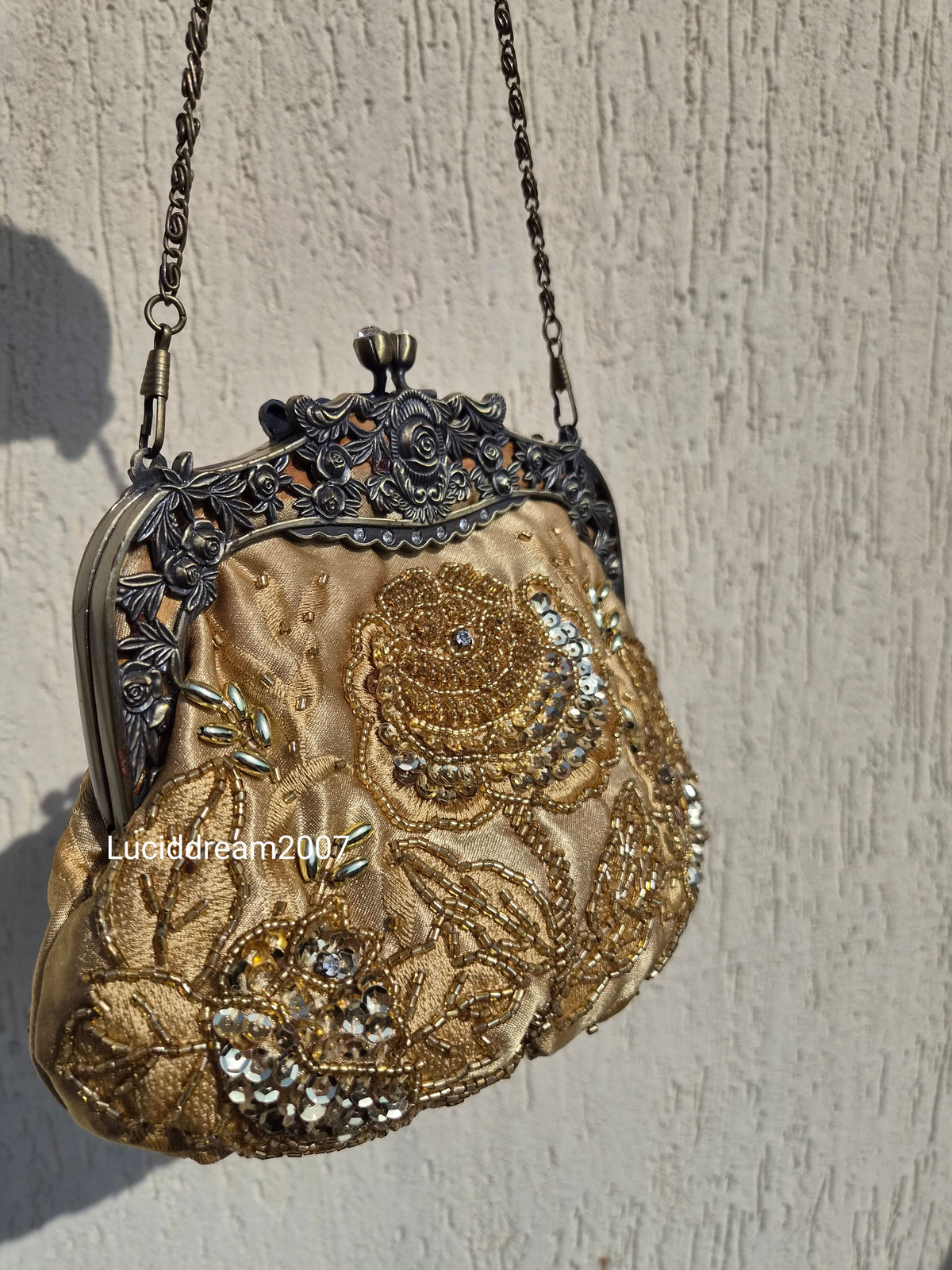 Embroidered gold bag