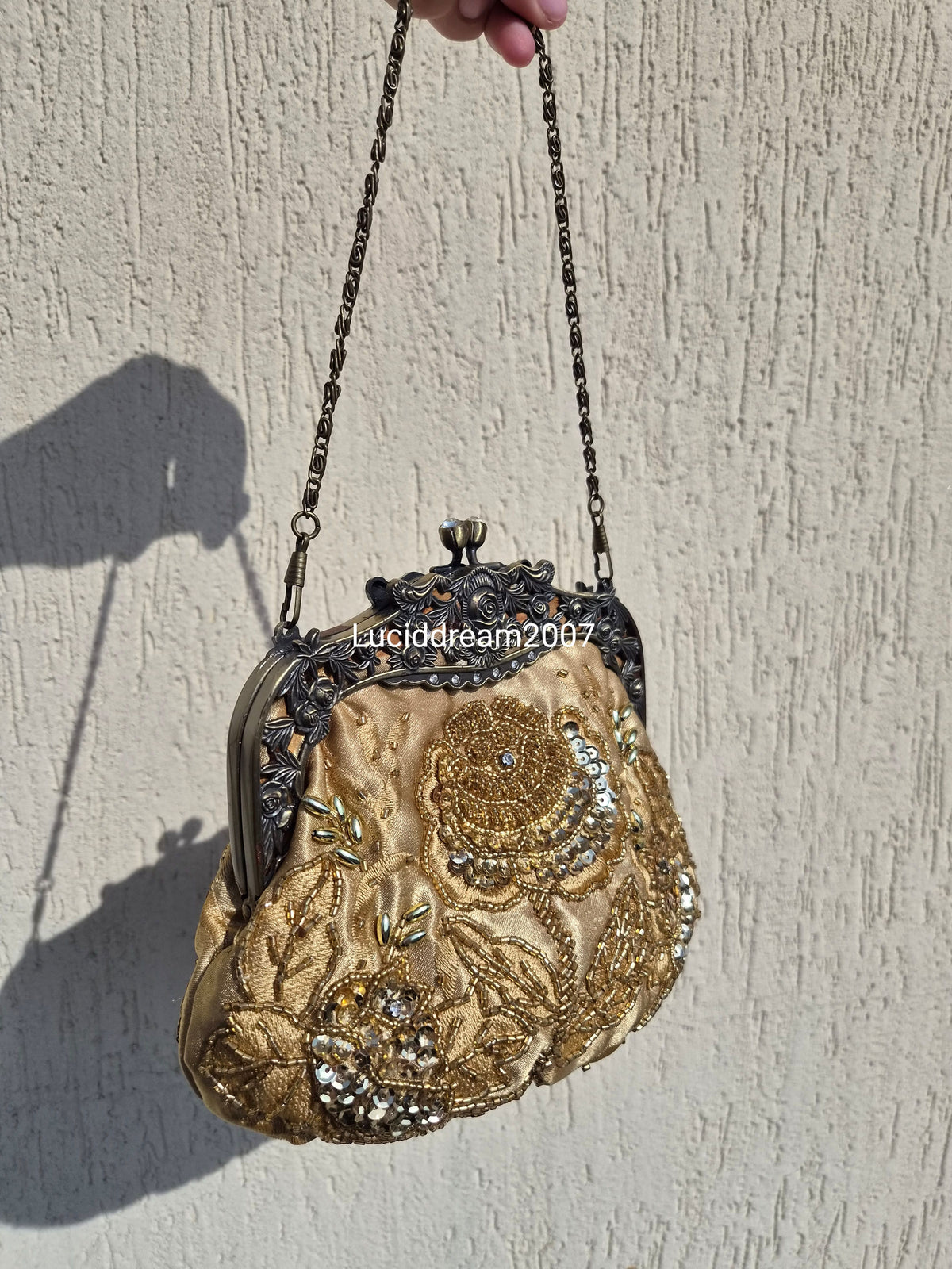 Embroidered gold bag