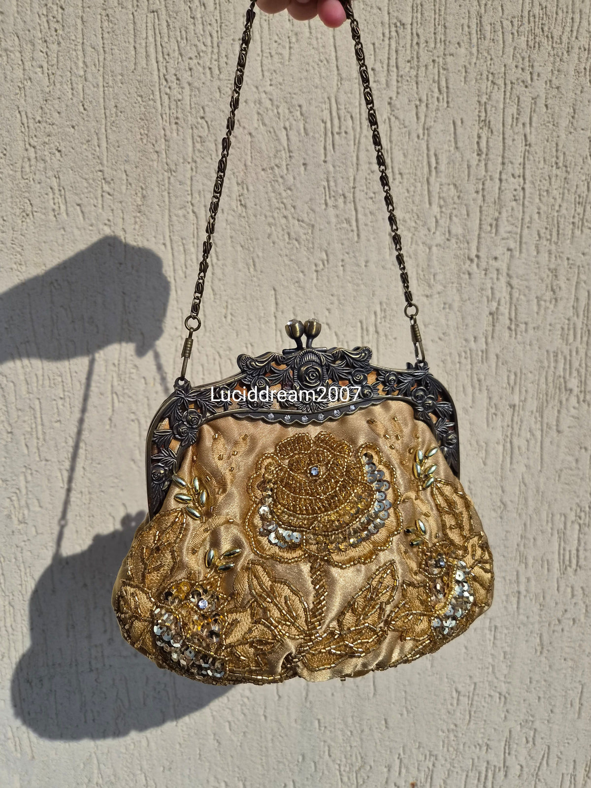 Embroidered gold bag
