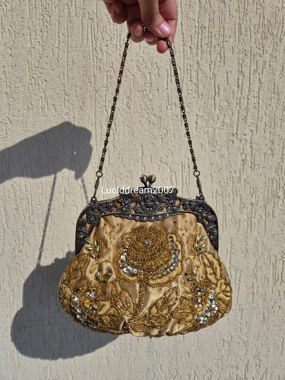Embroidered gold bag