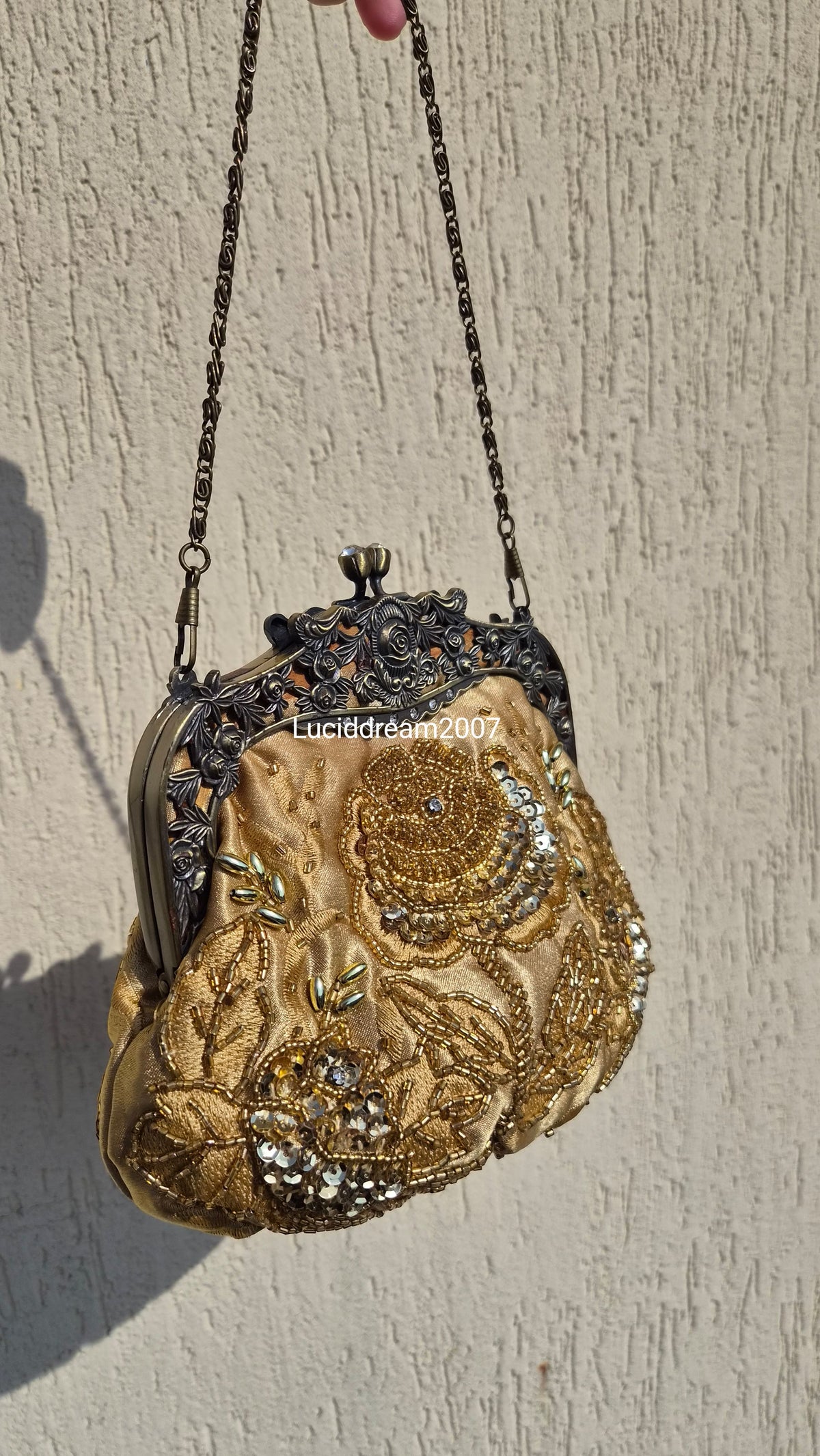 Embroidered gold bag