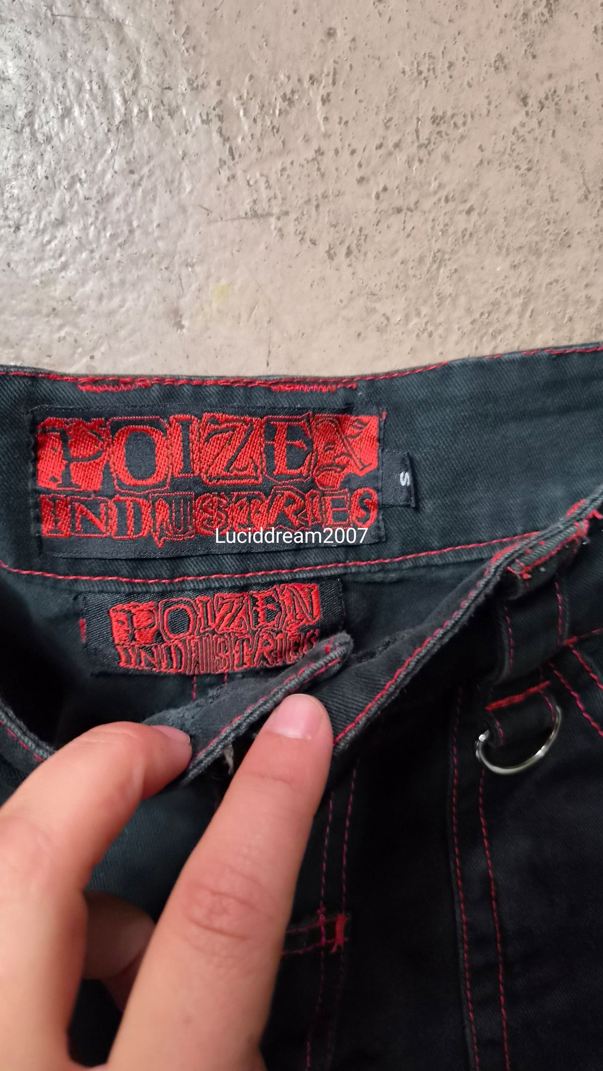 Pantalon noir et rouge Poizen Industries
