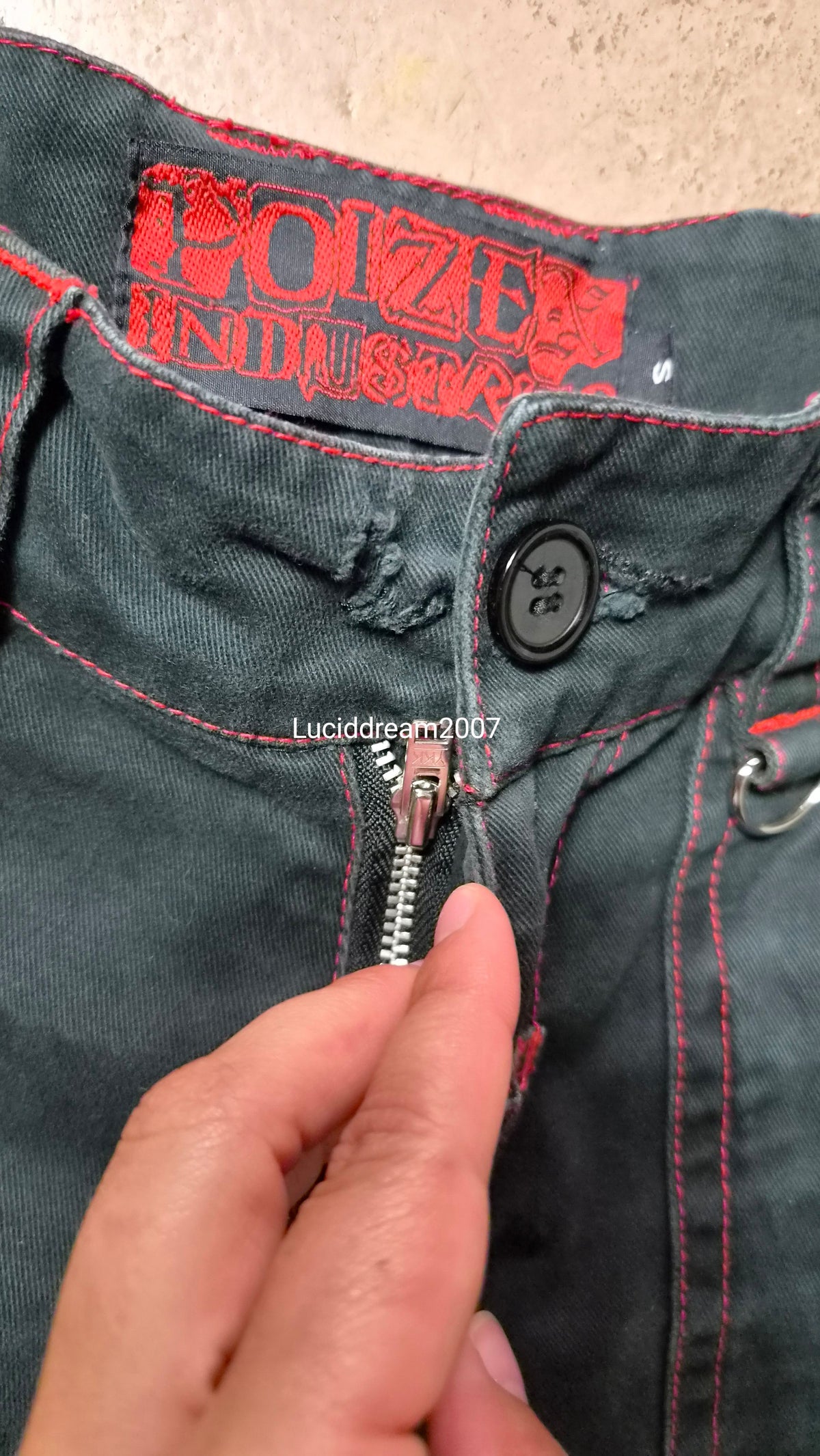Pantalon noir et rouge Poizen Industries
