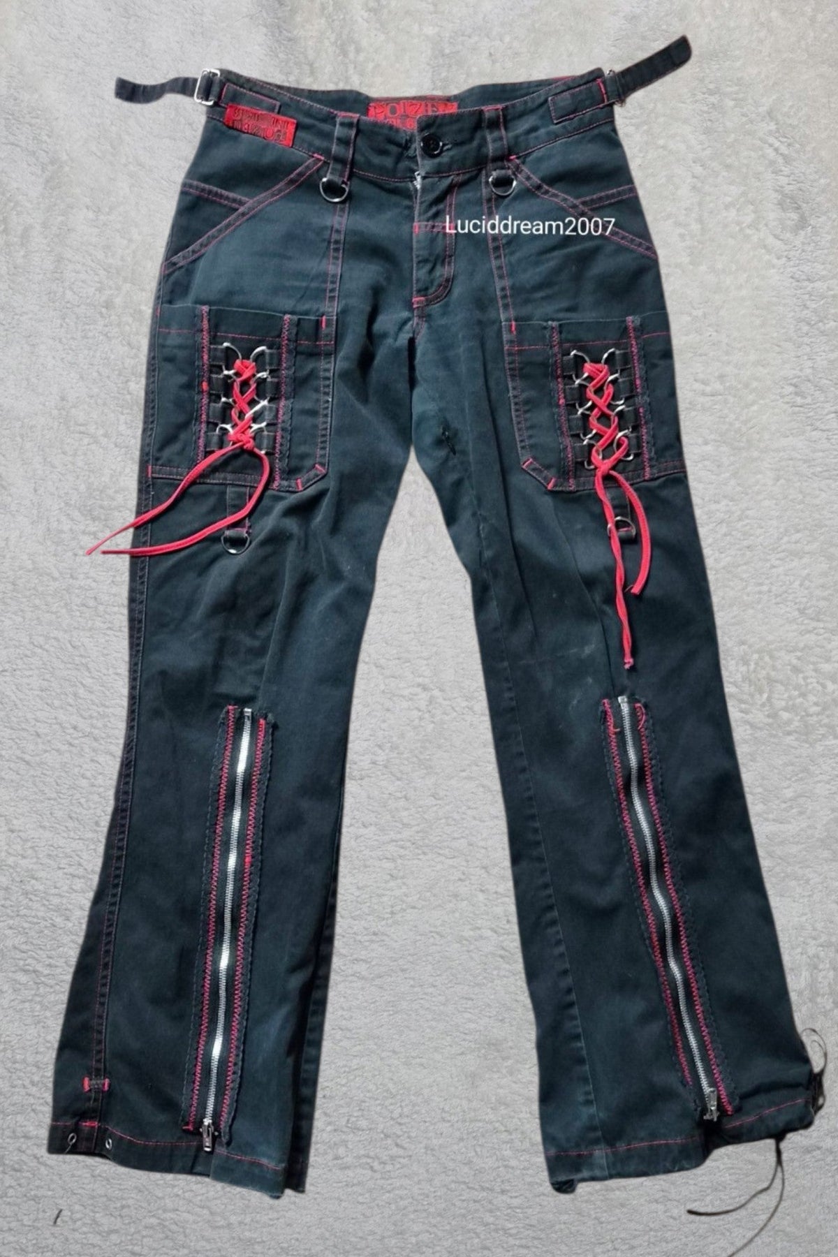 Pantalon noir et rouge Poizen Industries