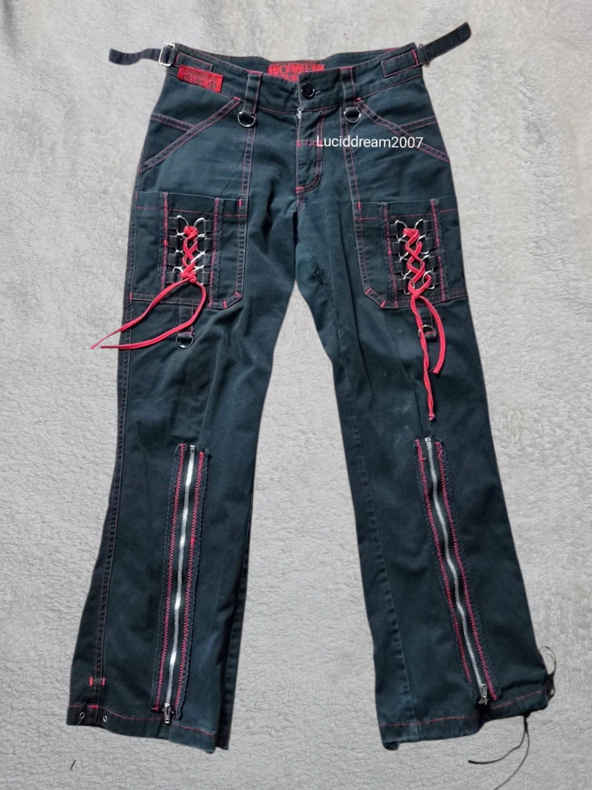 Pantalon noir et rouge Poizen Industries