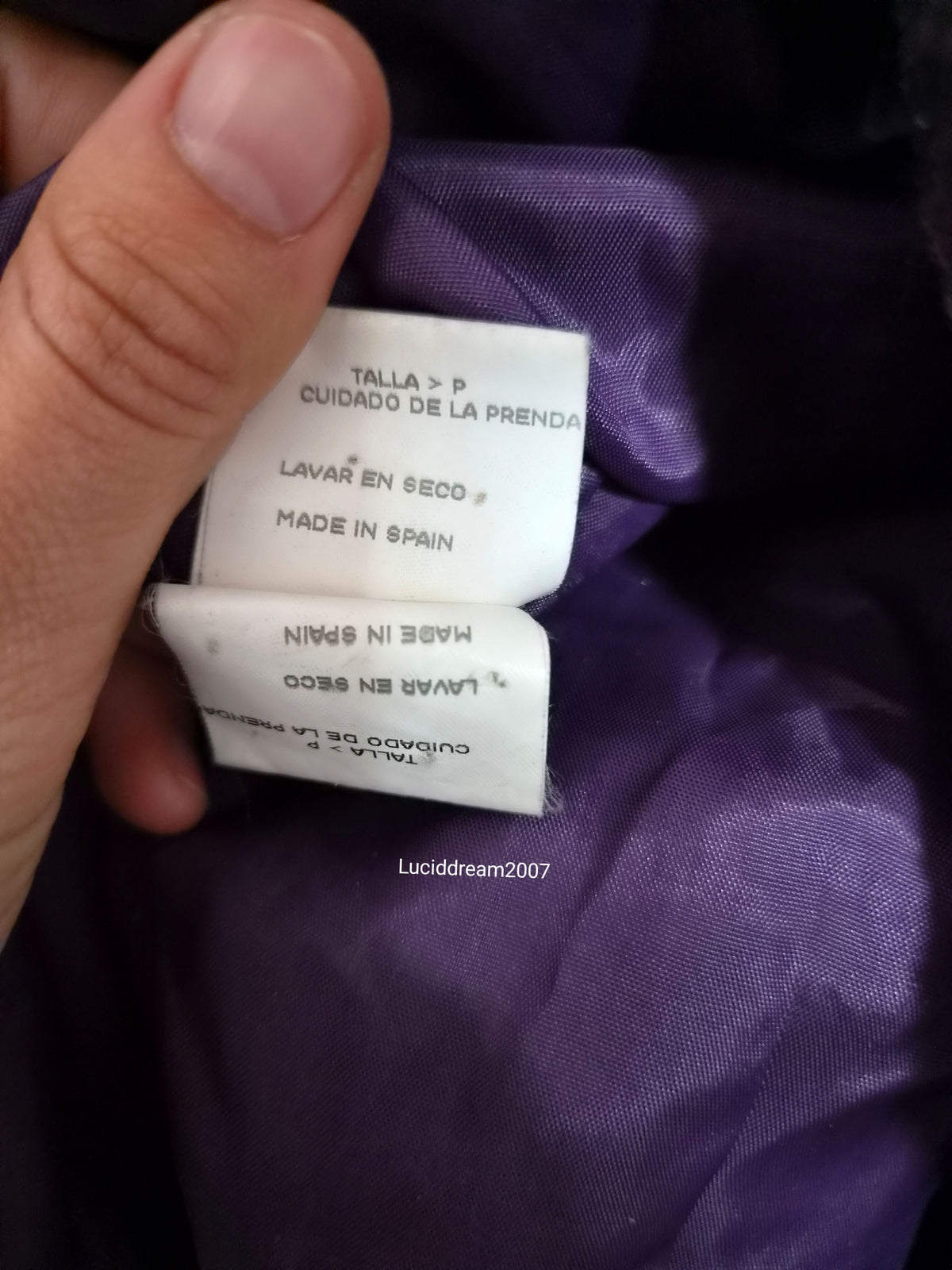 Manteau en fausse fourrure violet