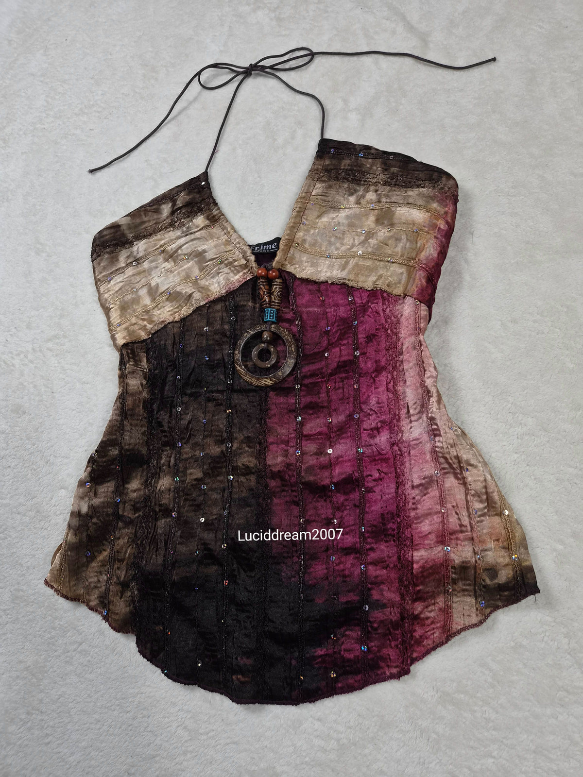 Haut dos nu tons beige et violet