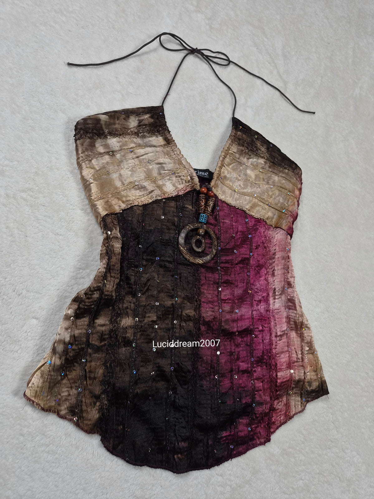 Haut dos nu tons beige et violet