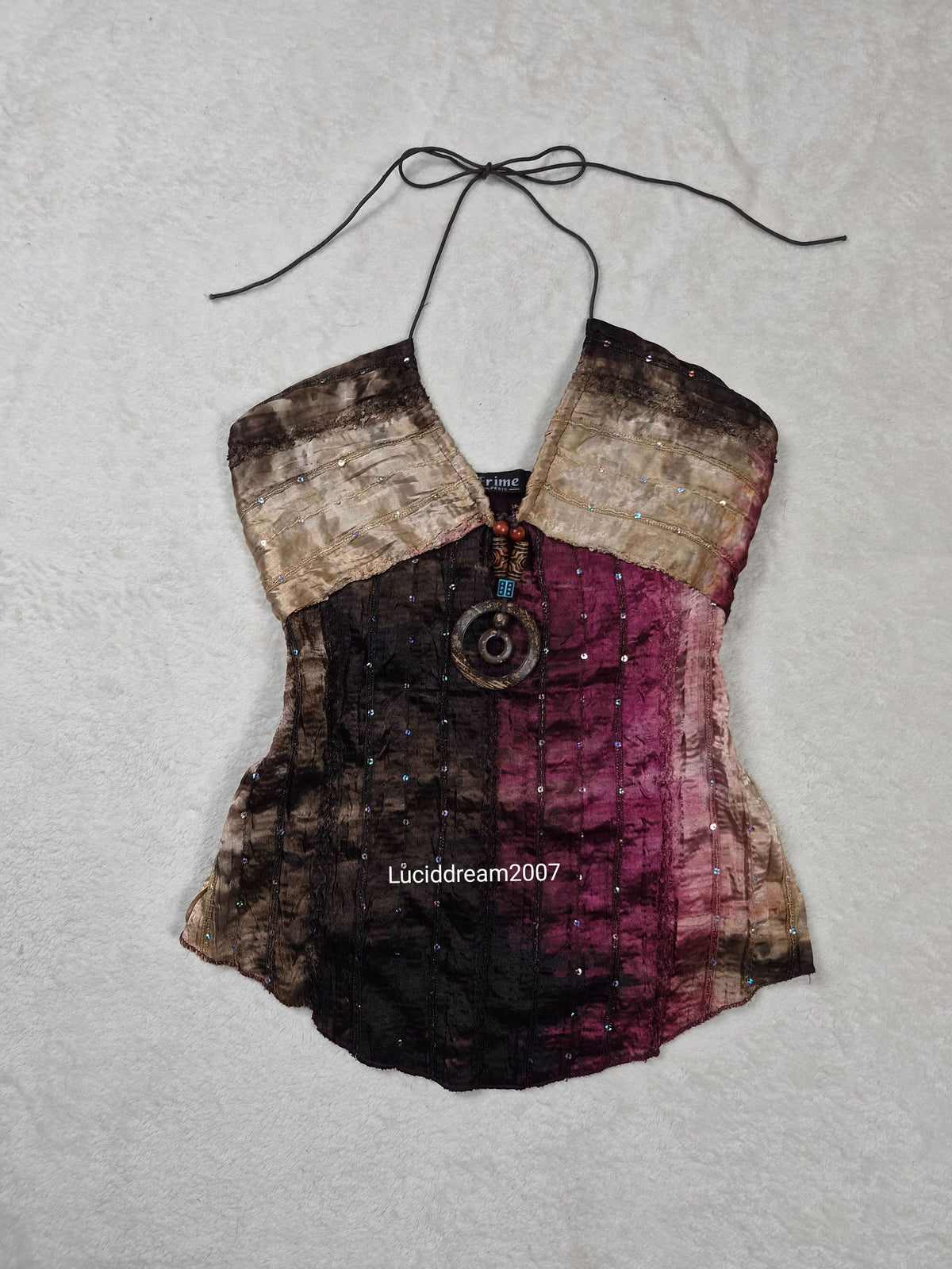 Haut dos nu tons beige et violet