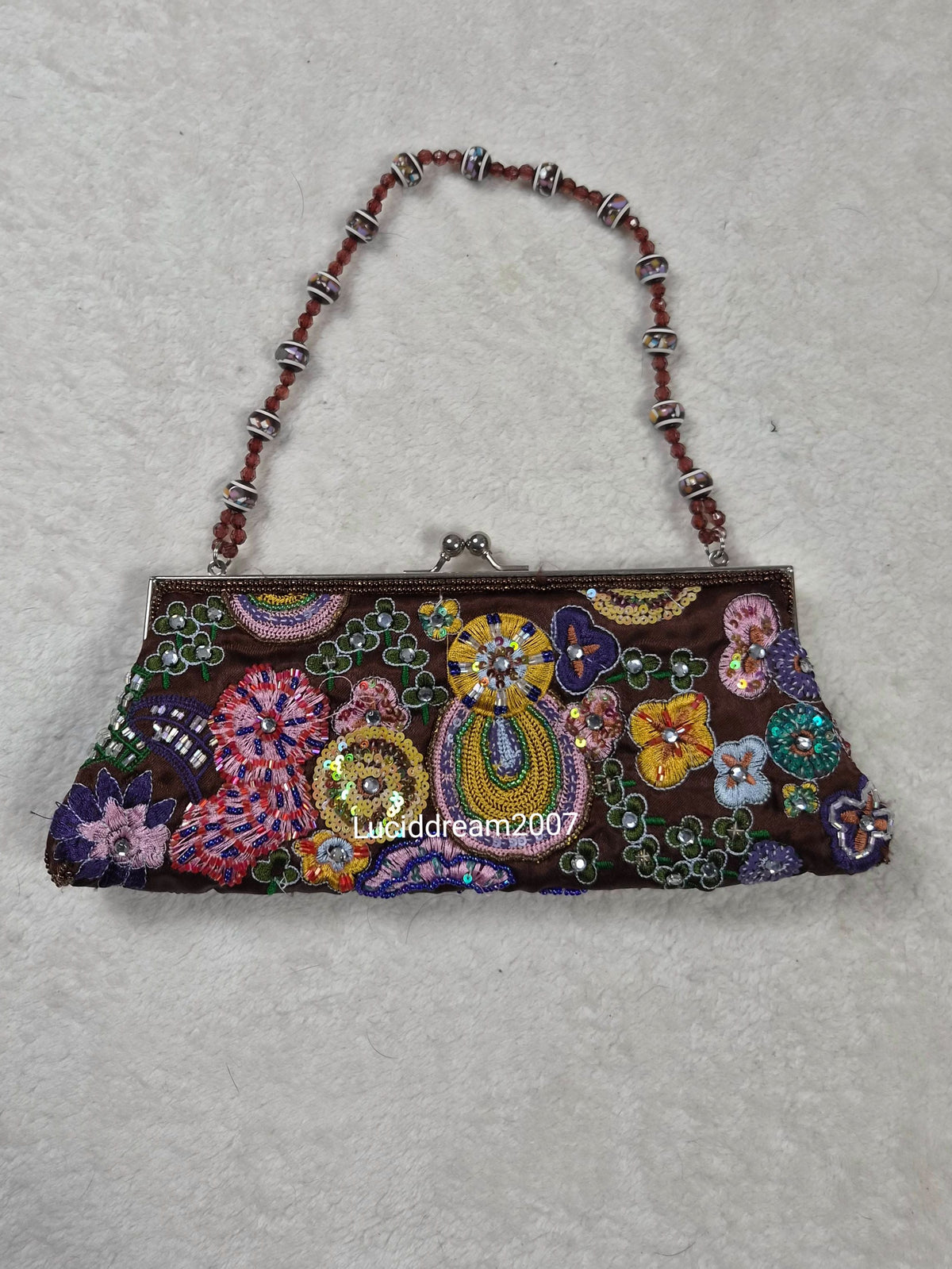 Small black bag embroidered with beads and sequins