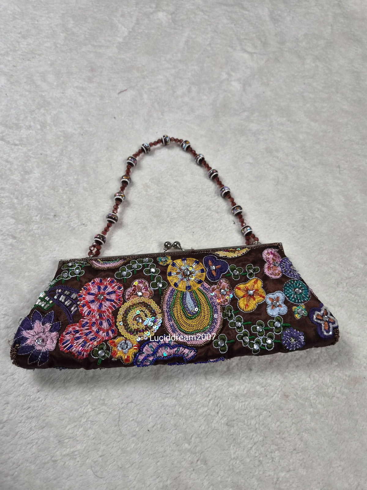 Small black bag embroidered with beads and sequins