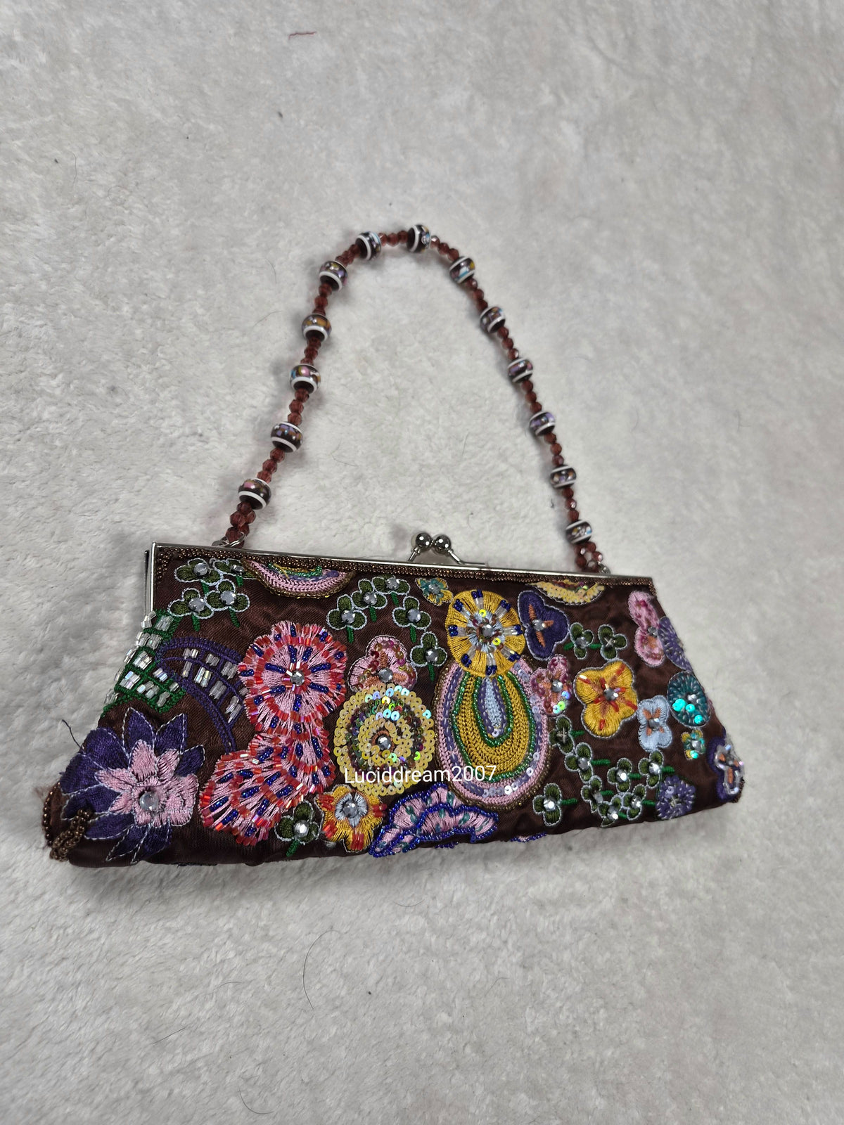 Small black bag embroidered with beads and sequins
