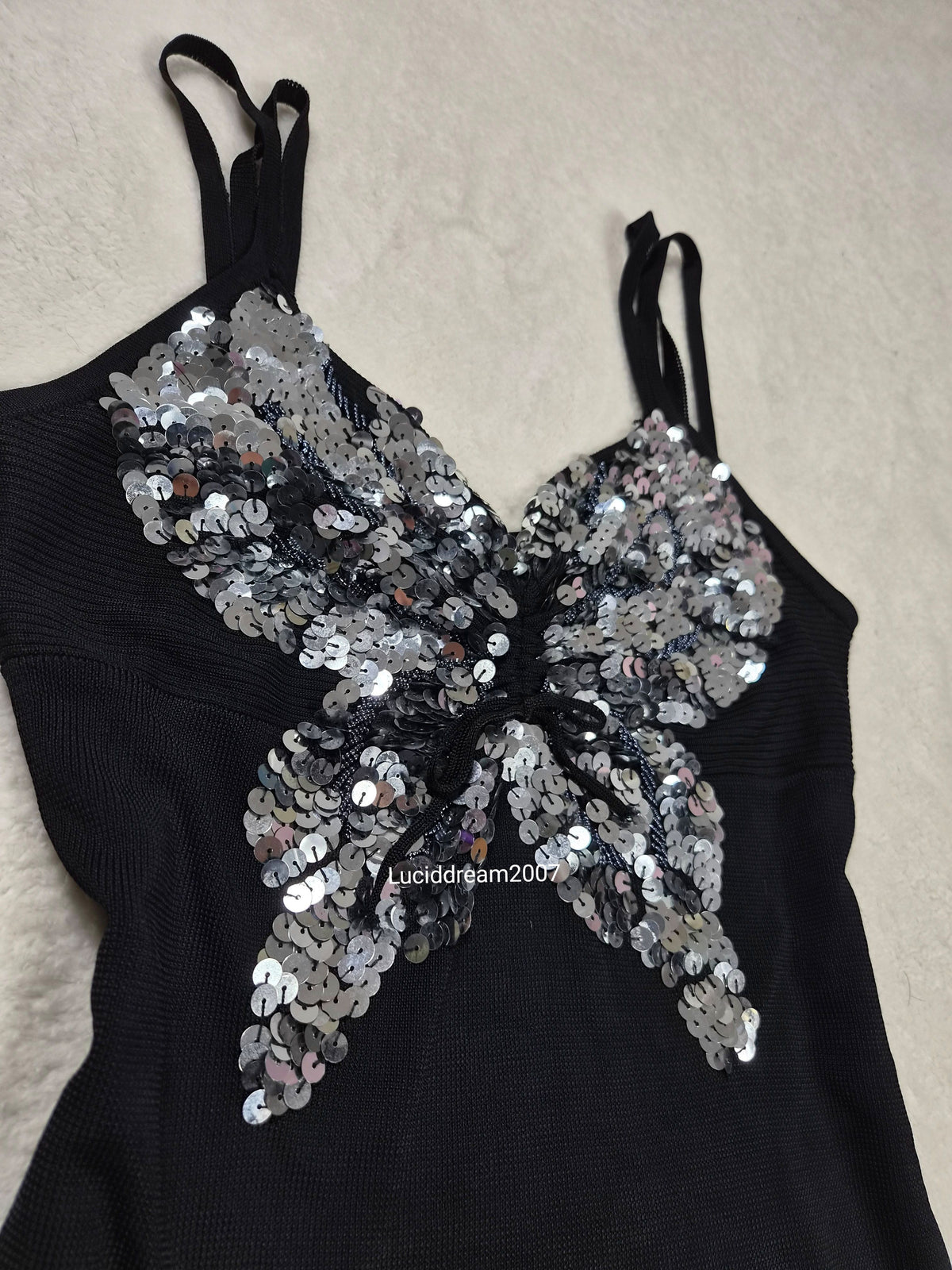 Haut noir papillon en sequins