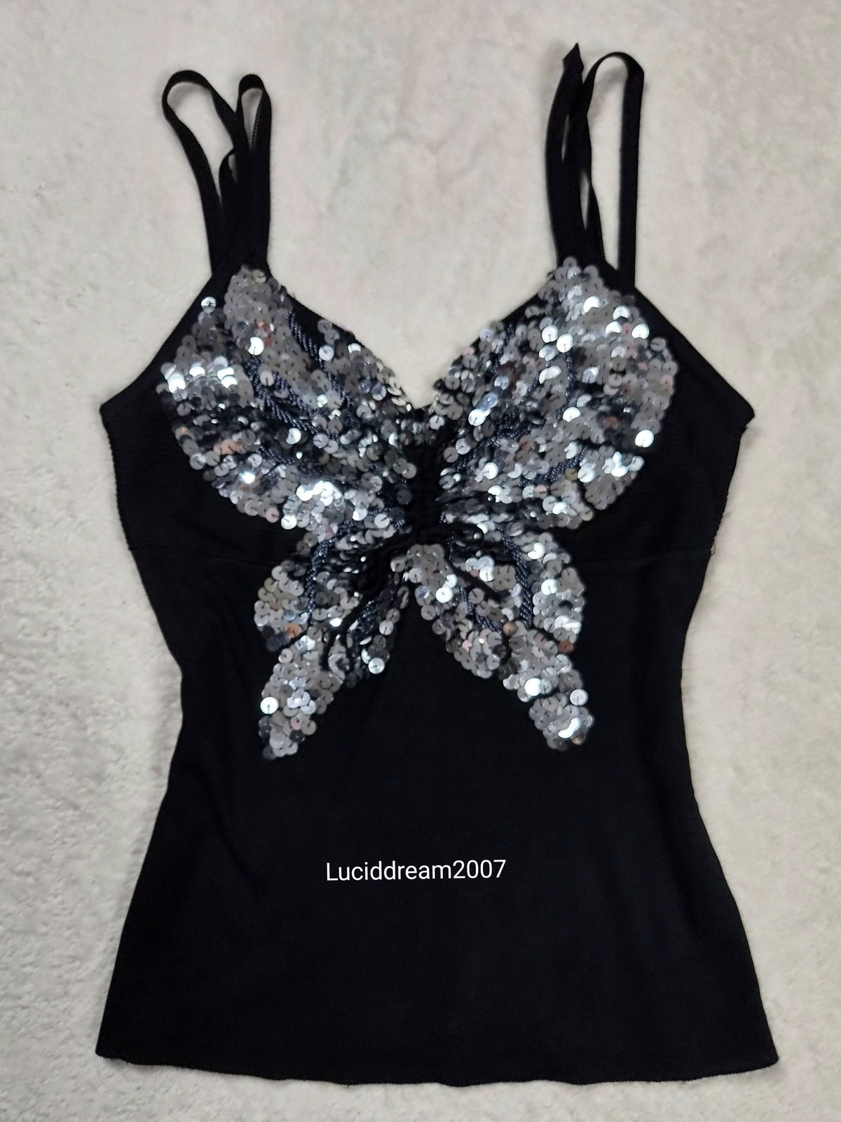 Haut noir papillon en sequins