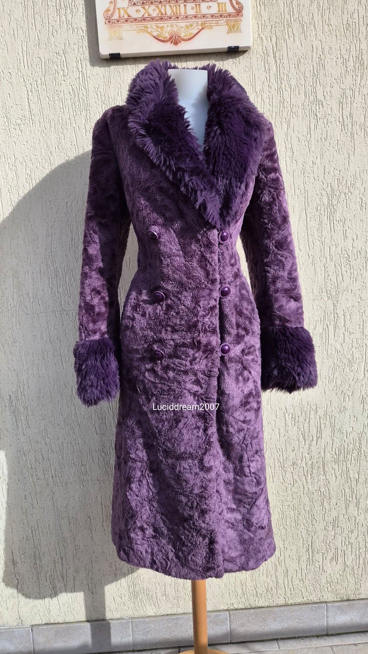 Manteau en fausse fourrure violet