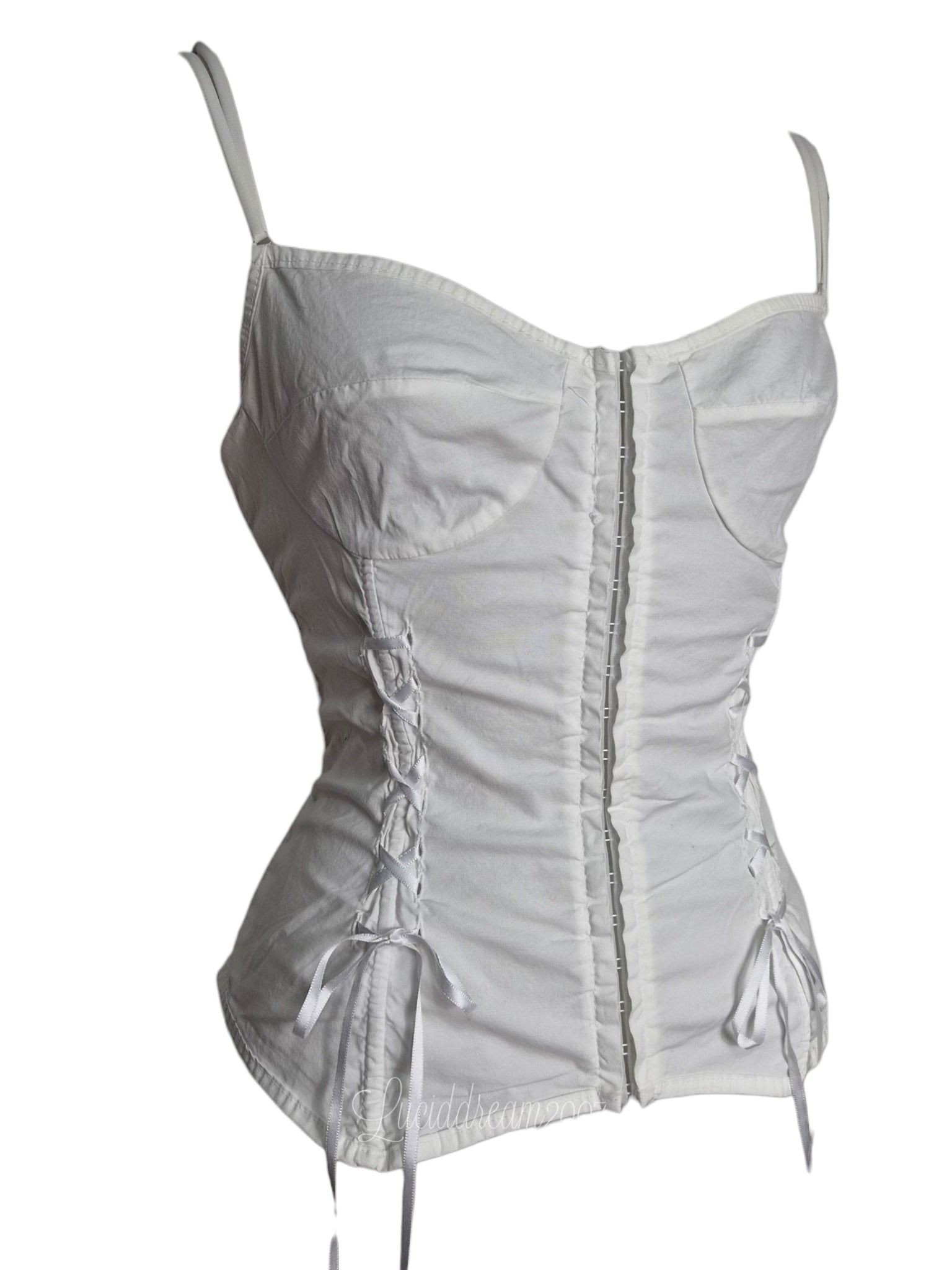 Haut vintage de type corset blanc, avec laçage et baleines. Top vintage dans le style coquette et cottagecore sorti d'une reverie.